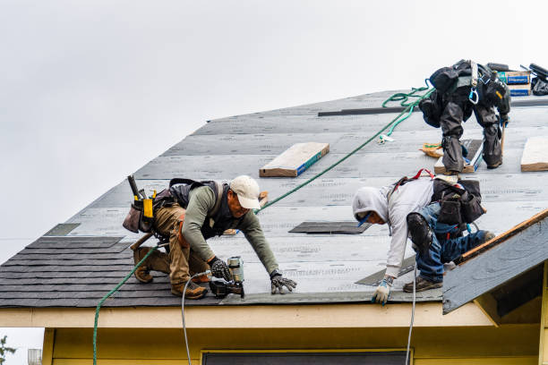 Professional Gutter Installation technician working in Creston, NE